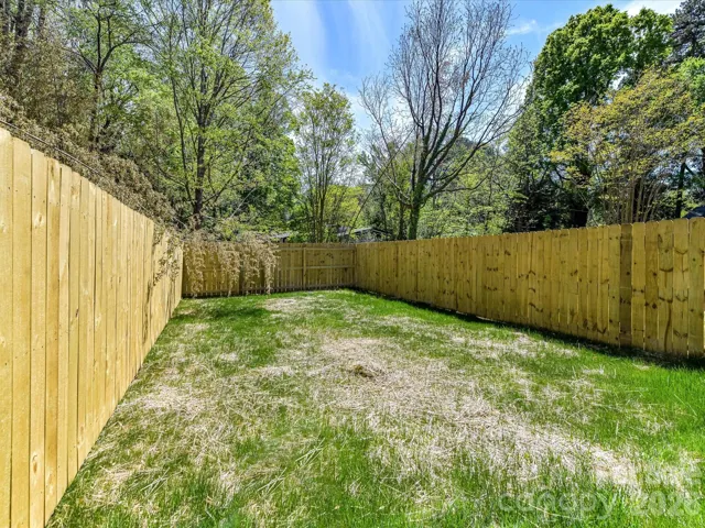 Sizeable fenced backyard offering privacy and plenty of room for outdoor entertaining, pets, or play.