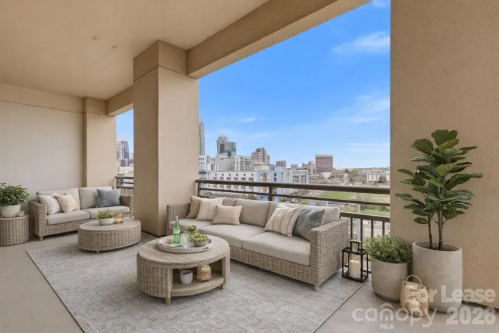 Private patio with city views - Virtually Staged
