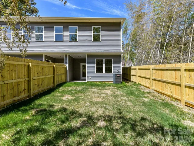 Fully fenced backyard with a privacy fence offers a private outdoor space perfect for relaxing, entertaining, or pets to play freely.