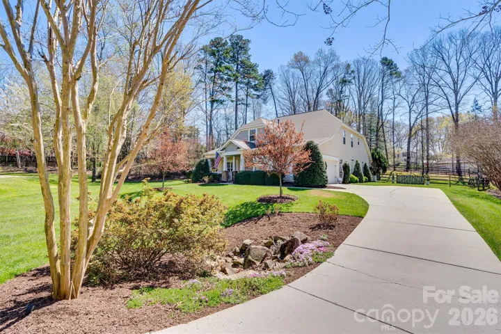 Beautifully landscaped yard creates such a pretty setting!