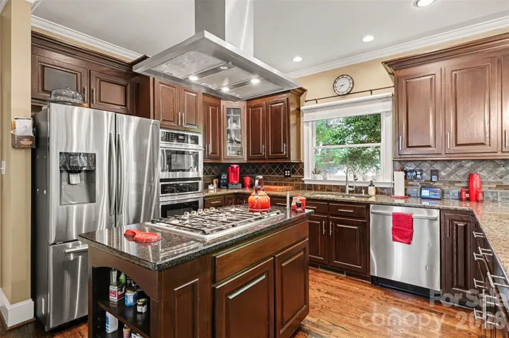 Kitchen with ample cabinetry and prep space