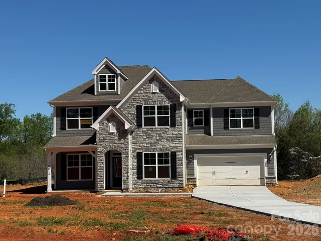 Homesite 56 features a Colfax plan