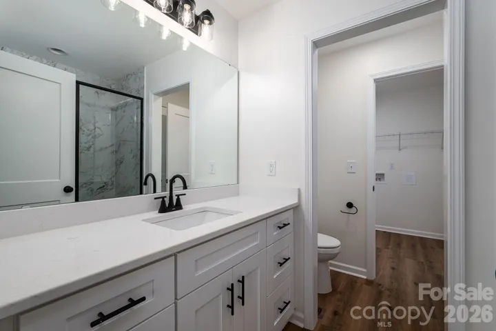 Primary Bathroom with private toilet area