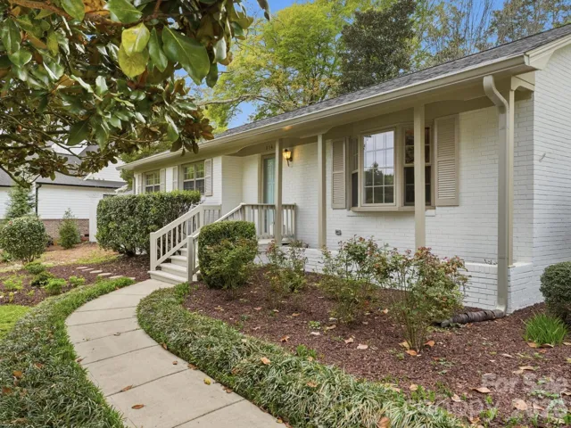 Location, Location, Location! Welcome home to 814 Twin Oaks Rd. on over half an acre private lot just a few minutes walk to downtown Davidson.