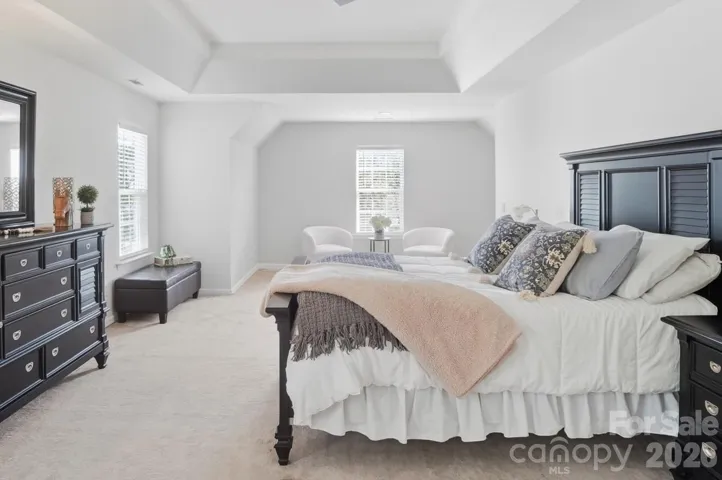 Primary bedroom with large sitting area