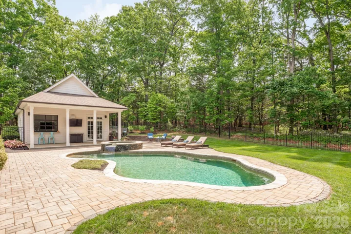 View of the yard from the primary suite door to the yard. 