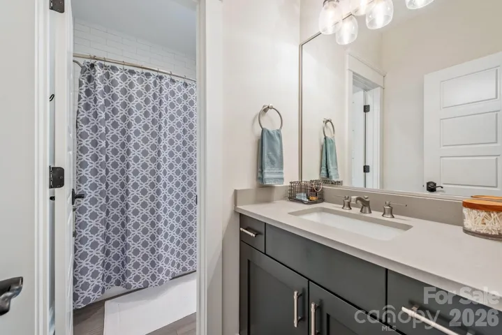 Second private vanity into shared bath