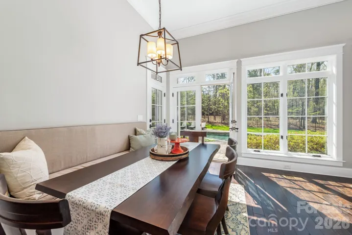 Breakfast room and french doors to back yard and screen porch