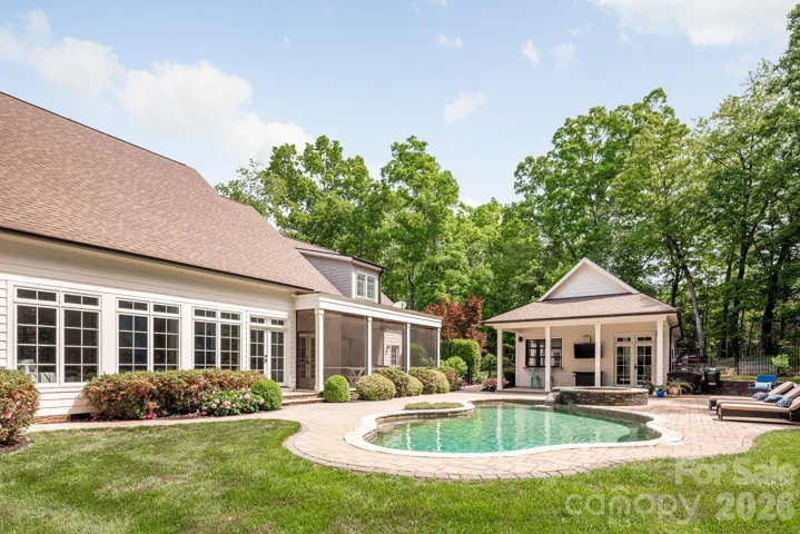 Saltwater pool and spa with fantastic pool house