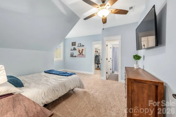 Second of 2 upstairs bedrooms with walk-in closet and large dormer nook