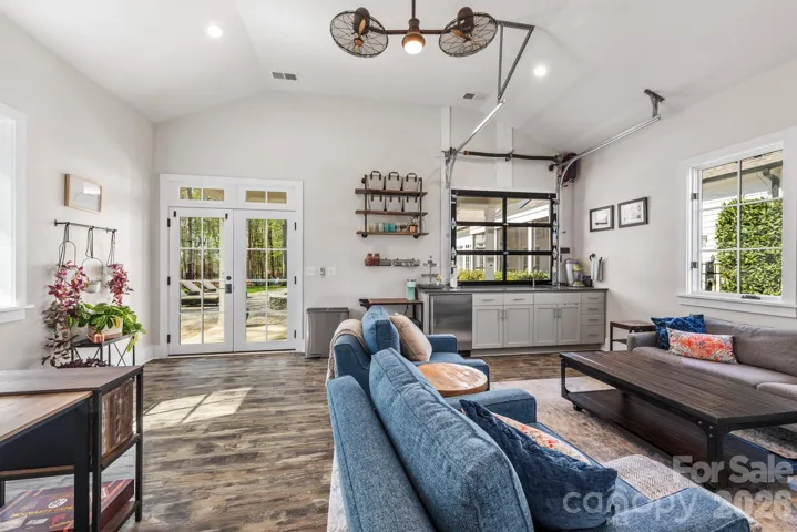 Bright, fun Rec room space can be used for gatherings, guests, hobby or work space.