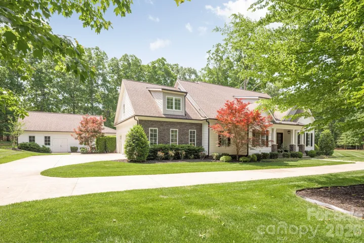 Front Left of Home, Garage access and side of Pool House