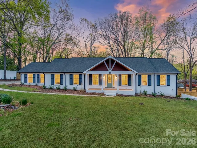 Exceptional renovated Family Home with Large Private Front Yard and Fenced in Backyard