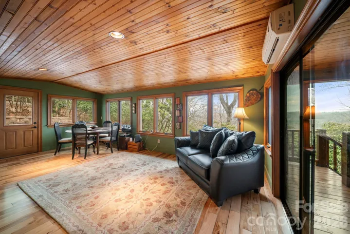 sunroom with mountain views and natural light
