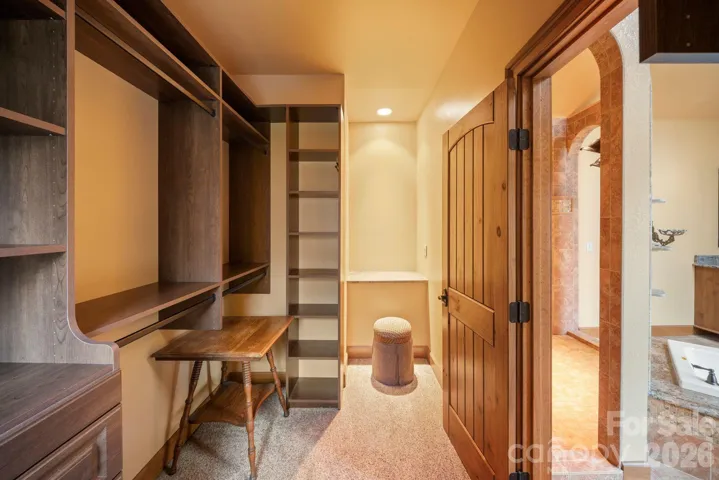 one of two walk in closets in primary 