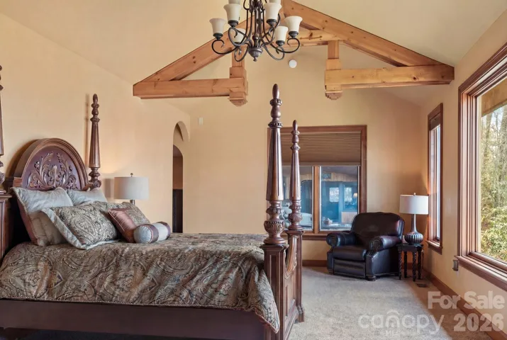 primary bedroom offers scenic mountain views