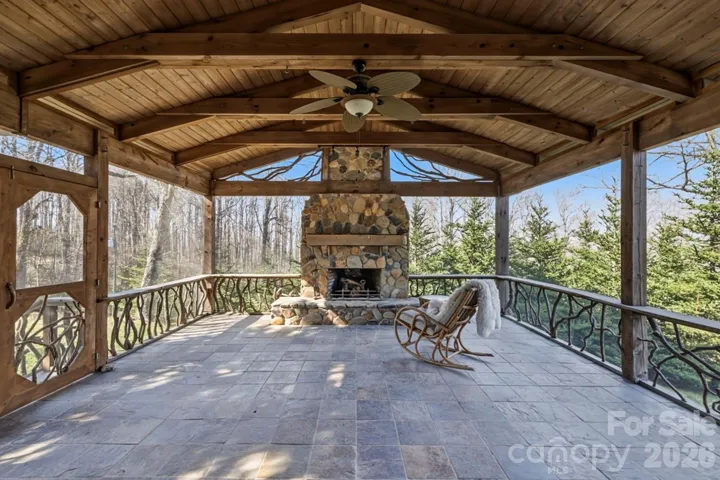 Large screened porch with wood burning fireplace