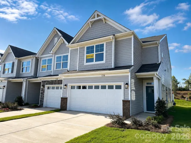 Homesite 7 features a Southampton end unit with a 2-car garage