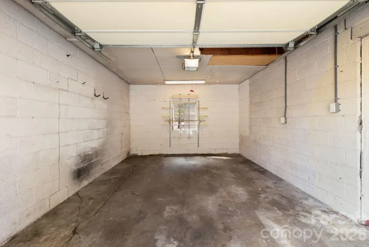 Main level garage accessed from Holtzclaw Street - features remote control, numberpad and push button