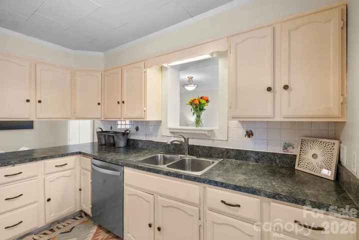 Kitchen features plenty of storage
