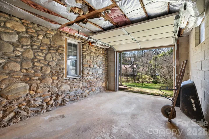 Lower level garage is accessed from Johnson Street