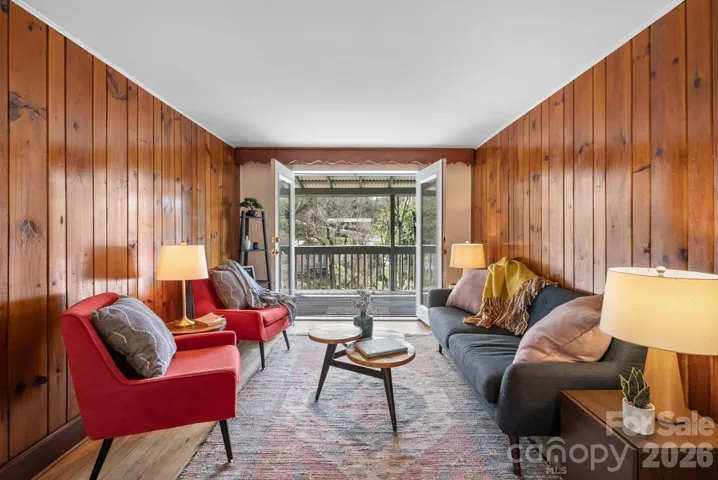 Living Room's French doors open up to deck for fresh air