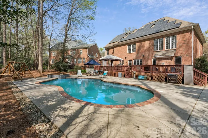 Your incredible in-ground pool with your ALL BRICK home right behind it!