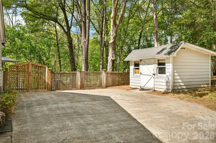 Driveway with storage shed