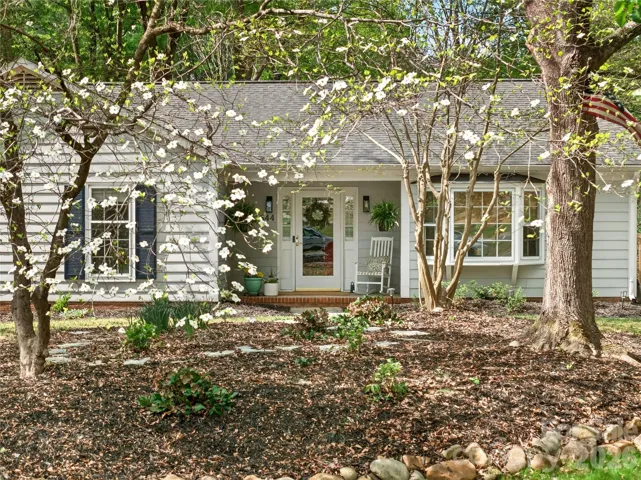 Lush DOGWOOD trees surround the property
