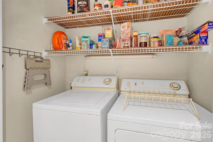 Laundry Closet in Kitchen.