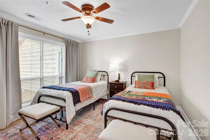 Bedroom with a lot of natural light.