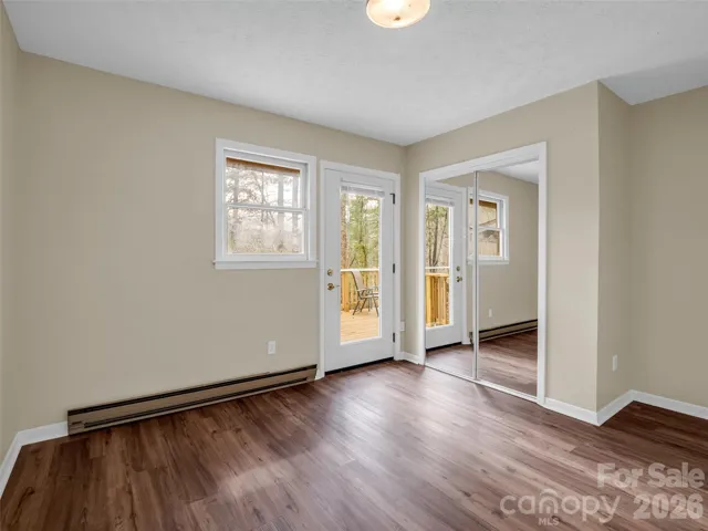 Main level bedroom with access to the deck