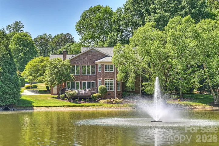 127 Summermore Dr is a full brick home overlooking a peaceful pond