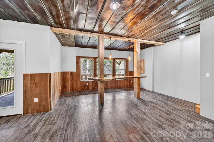 Lower level floating hardwood bar.