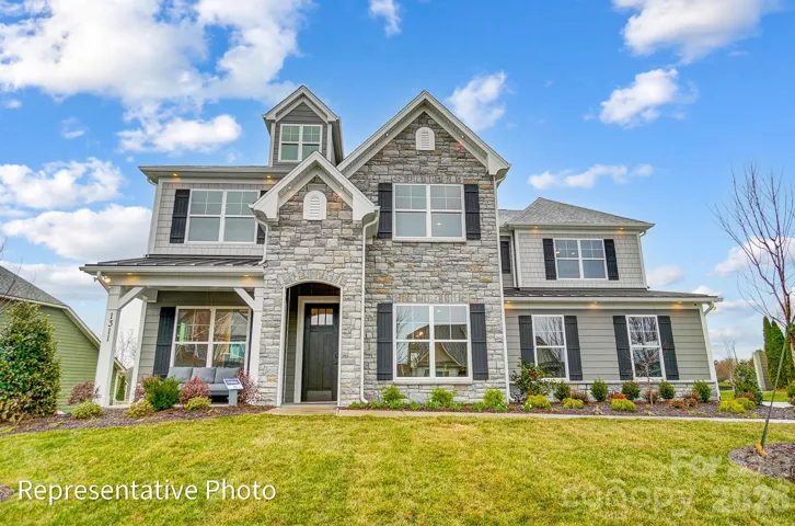 Homesite 412 features a Colfax plan with a sideload garage