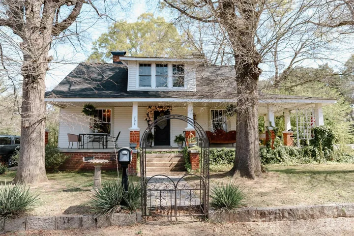 Charming historic home, corner lot with wraparound porch and garage, minutes from downtown Kannapolis NC!