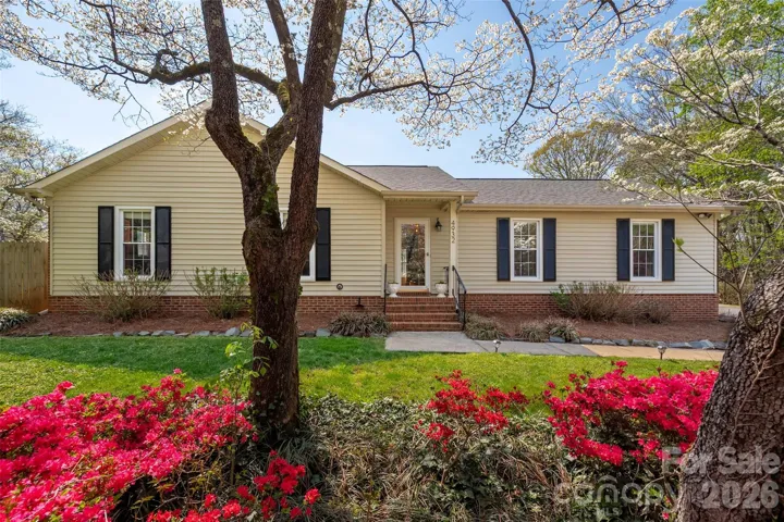 Welcome home to your own little slice of charm—nestled on a quiet cul-de-sac with blooming trees and storybook curb appeal.
