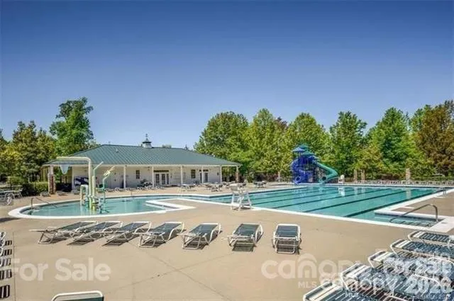 Community pool with so many amenities to entertain children