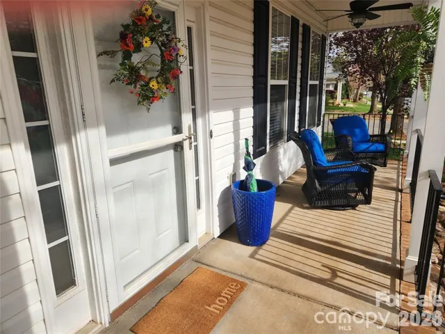 Long front, covered porch for sunset views