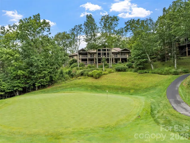 Exquisitely crafted estate with sweeping views of the 11th hole