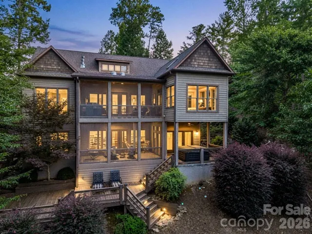 Entertaining is a breeze with main and lower level screened porches, along with a spacious sun deck.