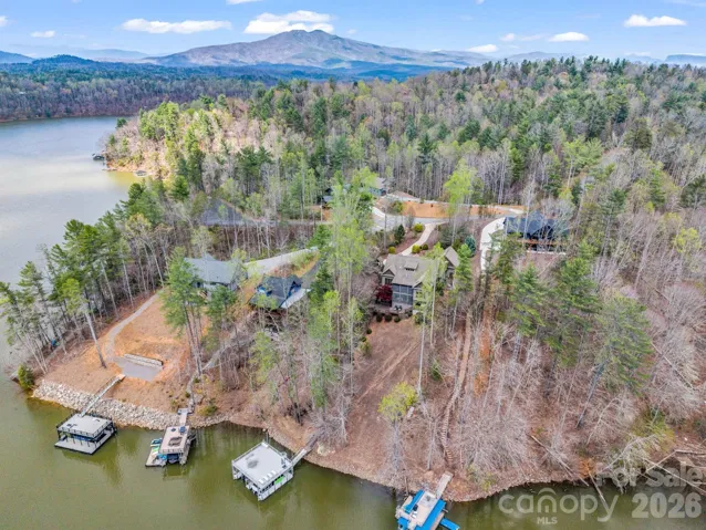 This luxury mountain retreat is located in The Abor of Lake James, providing room for everyone with endless boating, fishing and water sports.
