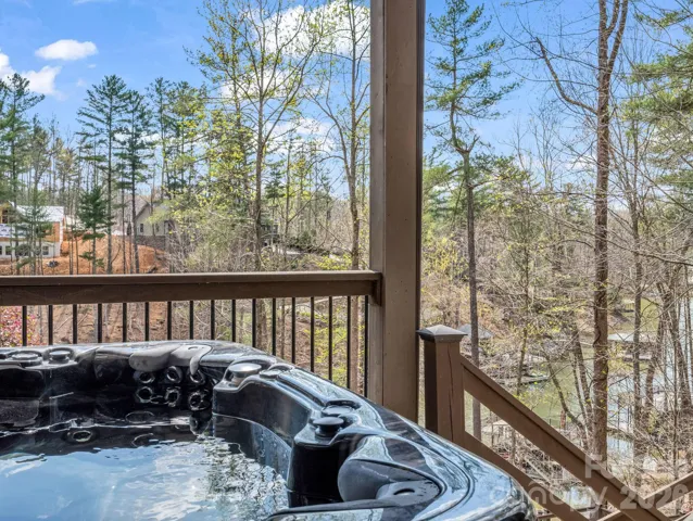 Indulge in a long relaxing soak in the hot tub overlooking the lake.