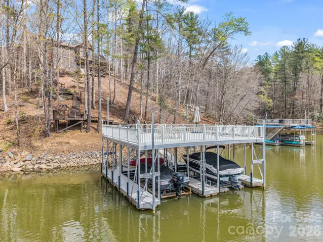 Let your summer fun begin!  Complete with double boat dock with lifts and sun deck .
