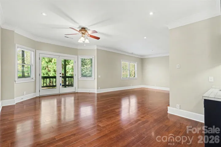 Lower level living space w/ wet bar and covered deck access