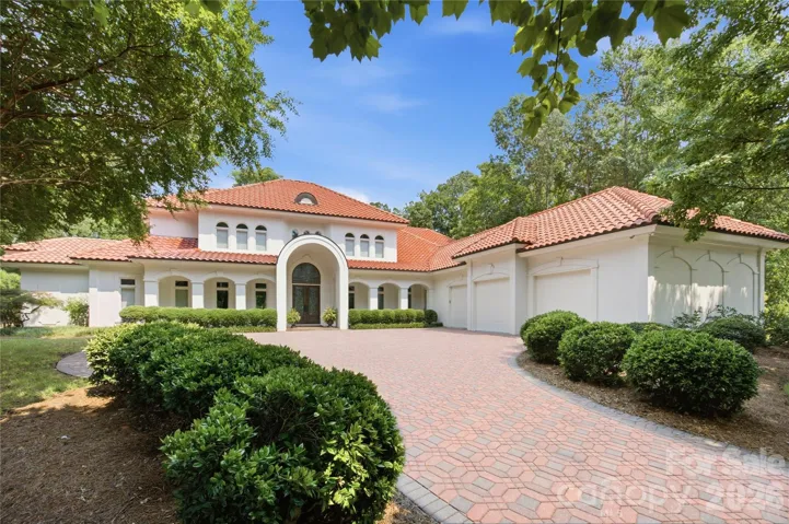 Three car garage with extended middle bay
