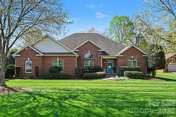 Full brick, custom built, one level home ideal for all ages