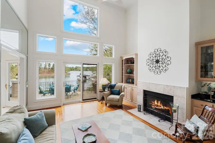 Gas log fireplace and a wet bar anchor this living space