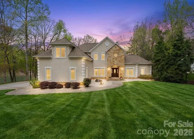 Nestled on 1.05 acres, this Lake Norman 