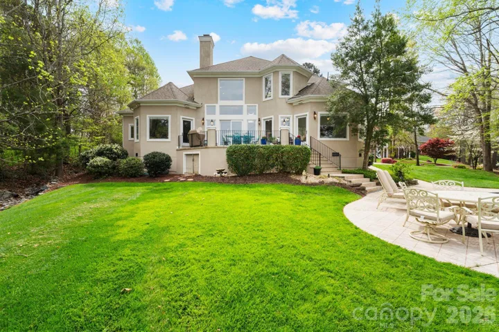Backyard retreat offers wet storage under the patio + dedicated dining spot
